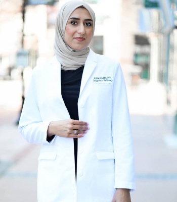 a colleague wearing a Medelita lab coat