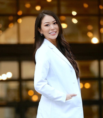 a colleague wearing a Medelita lab coat